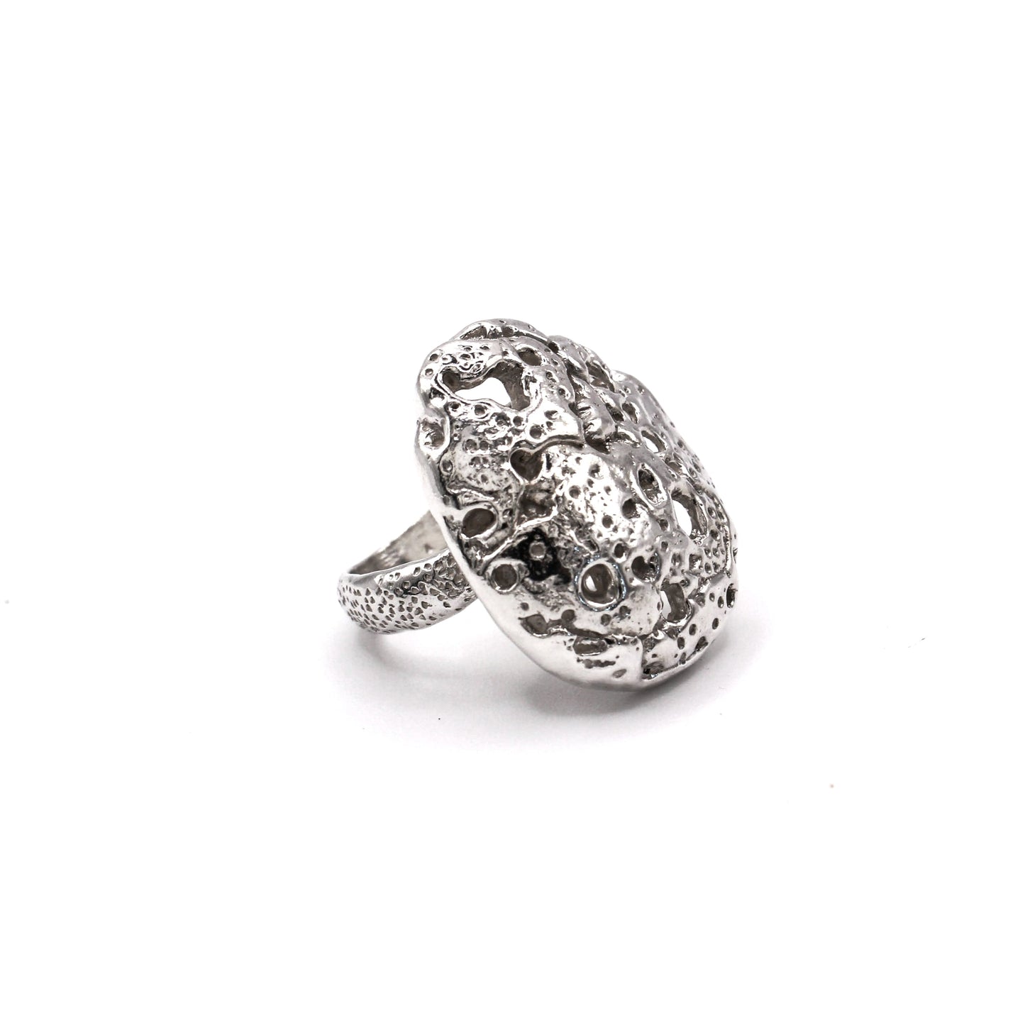 Unique silver statement ring from the Piedra Collection, wearable story of resilience. Anillo de plata único de la Colección Piedra, historia llevable de resiliencia.