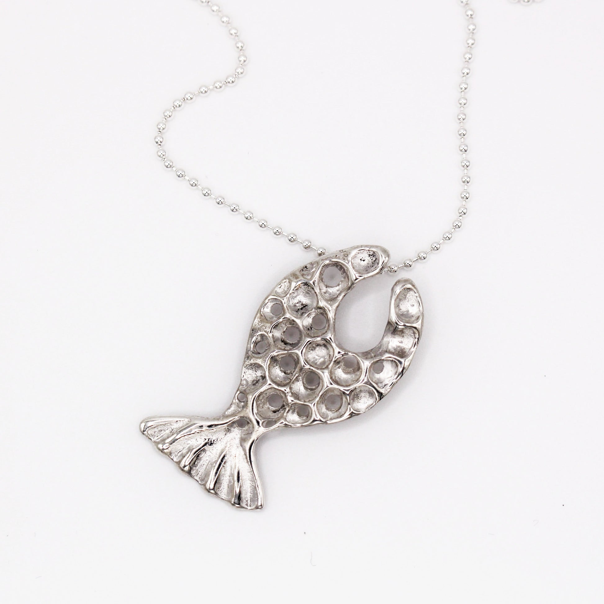 Sterling silver fish pendant, handcrafted using the lost wax casting technique. Unique Mediterranean-inspired jewelry, perfect for ocean lovers and sustainable fashion enthusiasts. Ethical and nature-inspired design, capturing the beauty of marine life in recycled silver
