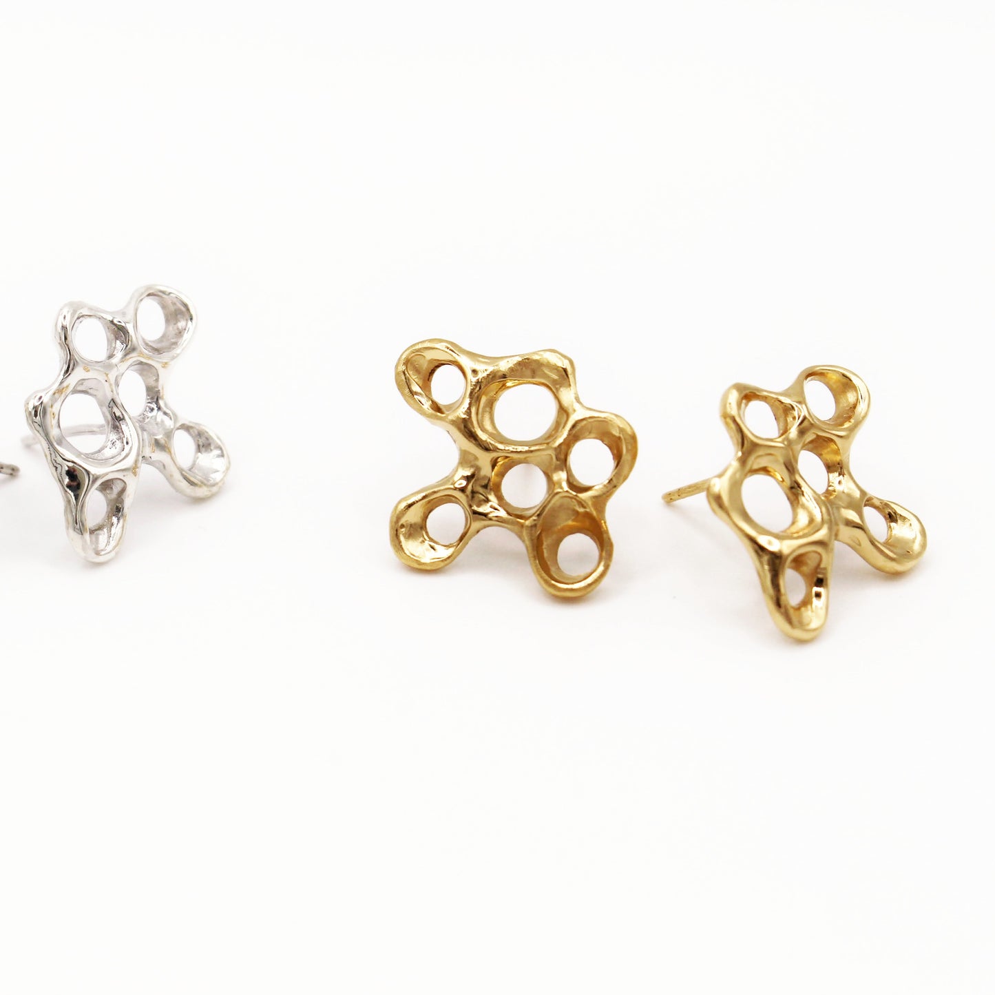 Gold plated barnacle earrings with sculptural design, meaningful statement jewelry