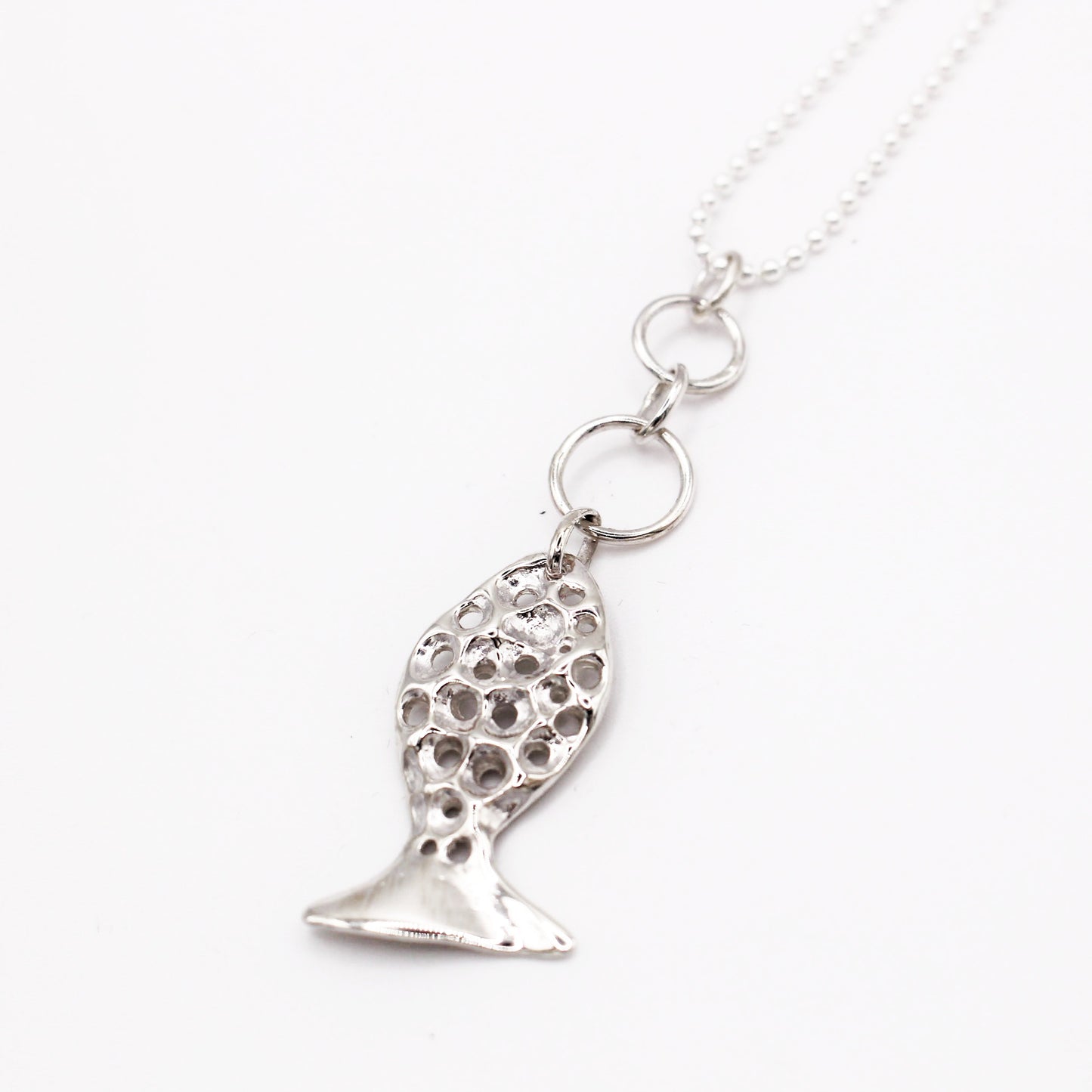 Sterling silver fish pendant, handcrafted using the lost wax casting technique. Unique Mediterranean-inspired jewelry, perfect for ocean lovers and sustainable fashion enthusiasts. Ethical and nature-inspired design, capturing the beauty of marine life in recycled silver