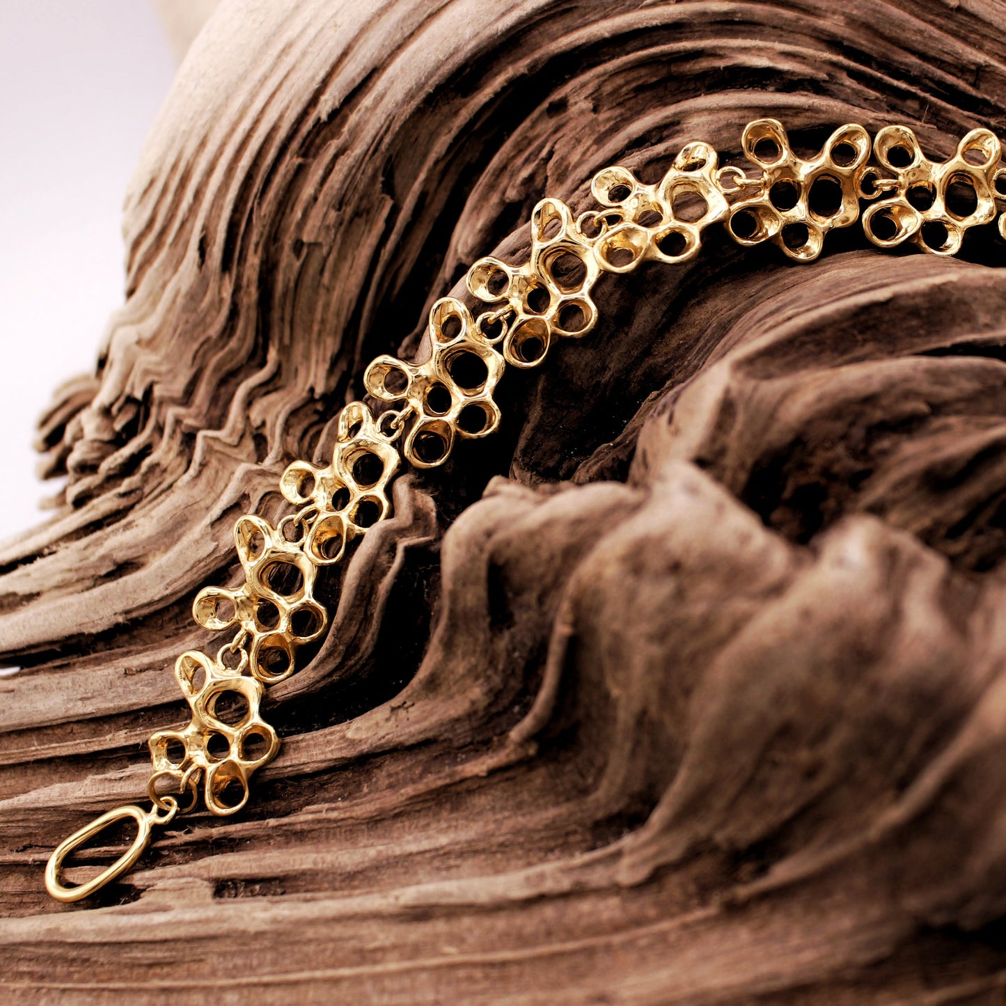 Gold plated barnacle bracelet with sculptural design, meaningful artisan jewelry