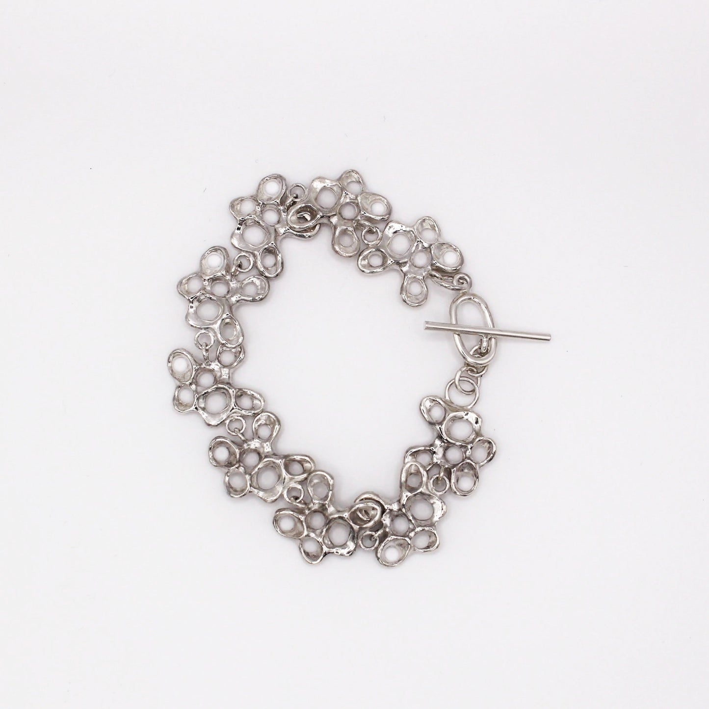 Statement silver bracelet inspired by Mediterranean sea life, artisan symbolic jewelry