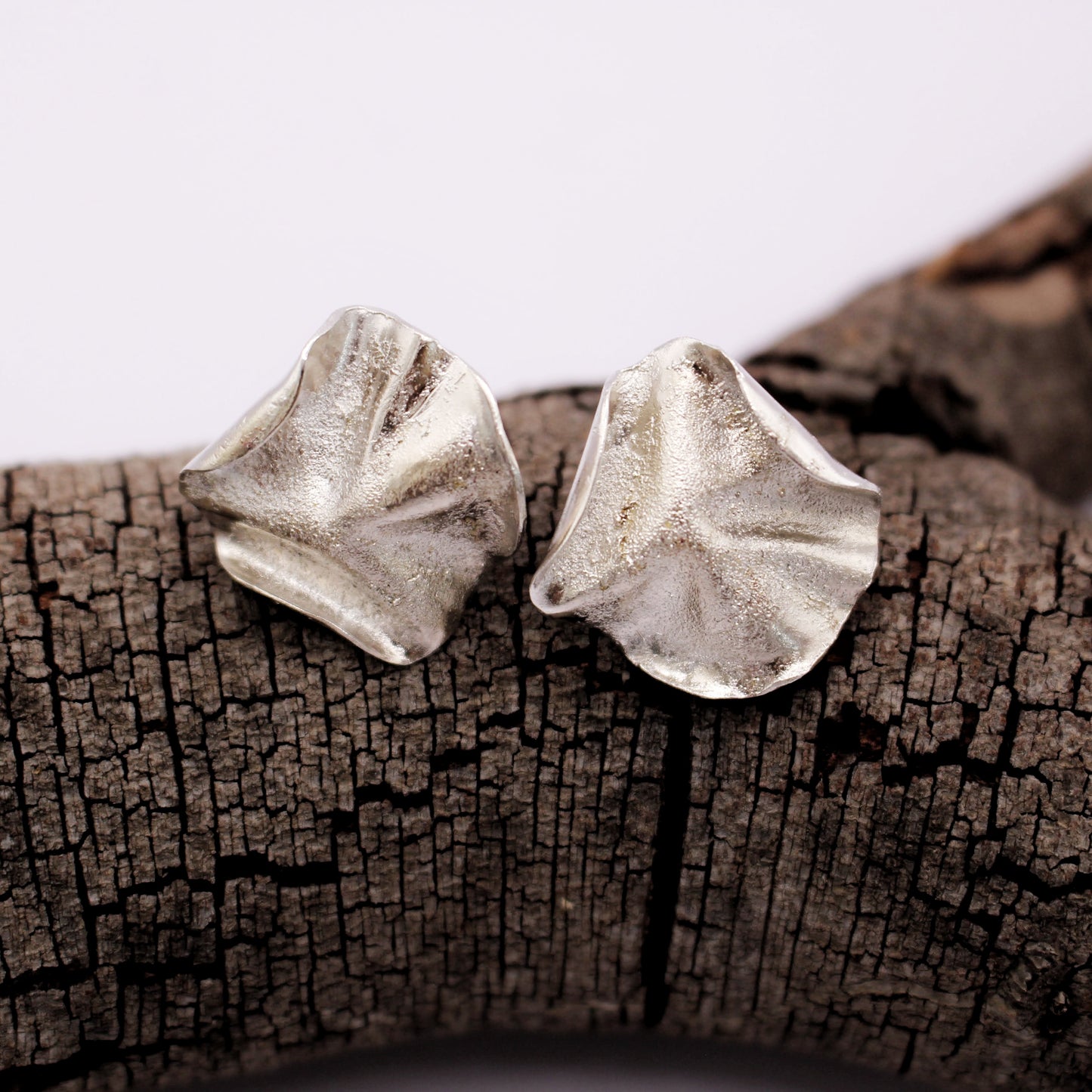 Sculptural silver earrings inspired by jellyfish and Mediterranean waves, organic statement jewelry by Naturalesa