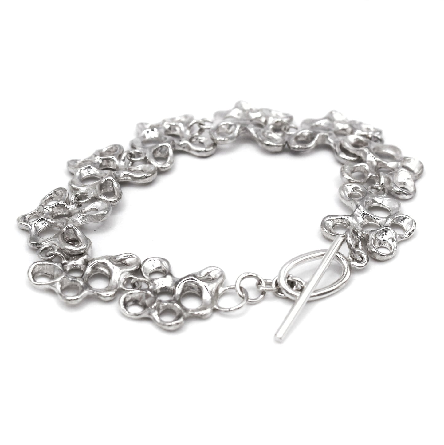 Statement silver bracelet inspired by Mediterranean sea life, artisan symbolic jewelry toggle clasp
