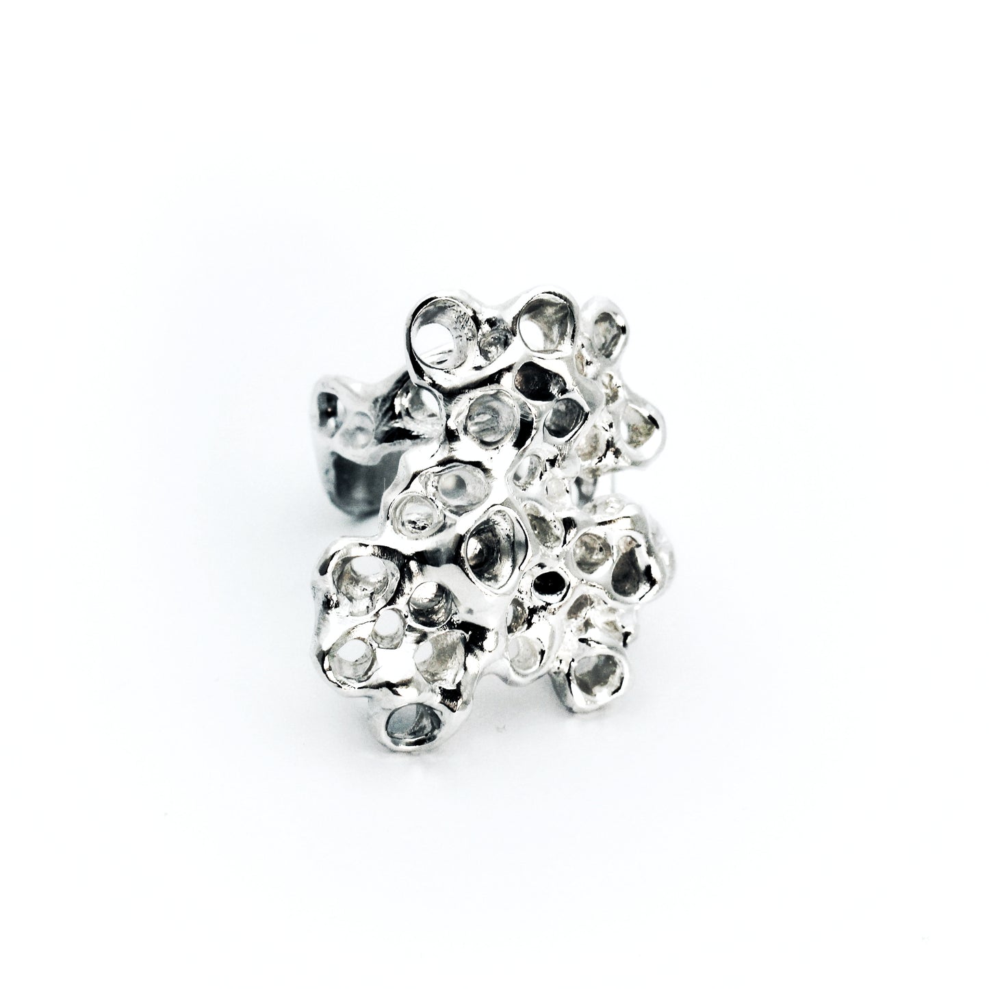 Silver statement ring with organic barnacle design, meaningful artisan jewelry symbolizing resilience