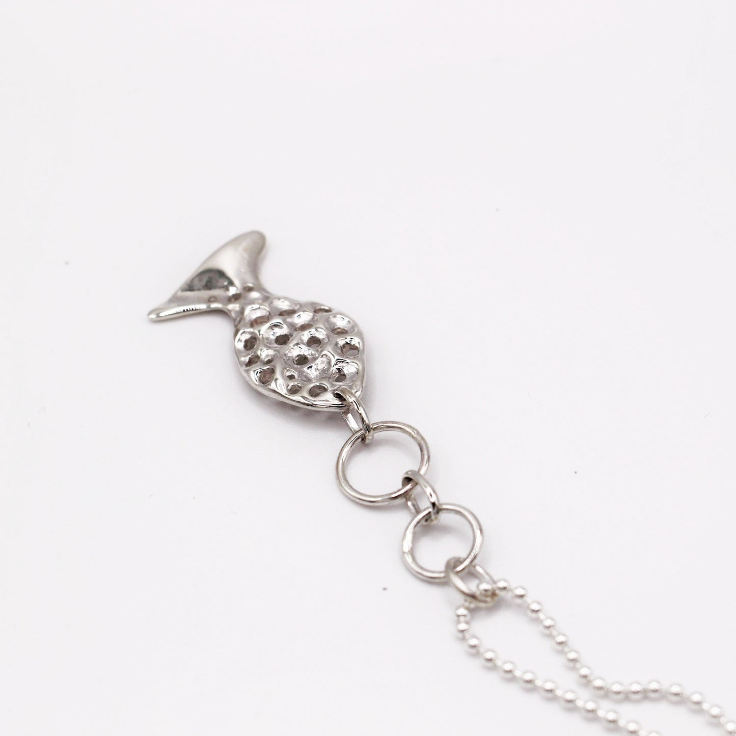 Sterling silver fish pendant, handcrafted using the lost wax casting technique. Unique Mediterranean-inspired jewelry, perfect for ocean lovers and sustainable fashion enthusiasts. Ethical and nature-inspired design, capturing the beauty of marine life in recycled silver