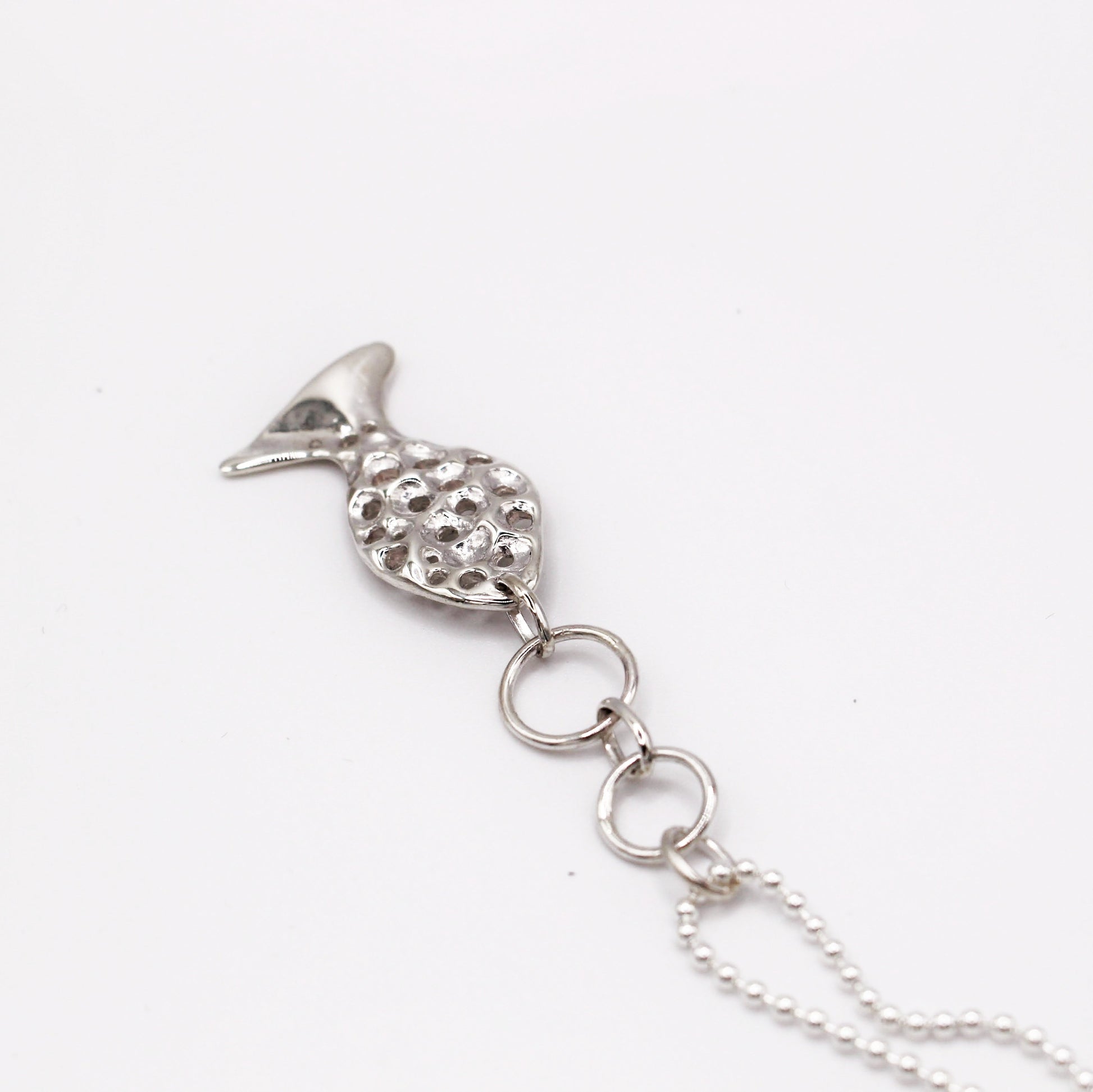 Sterling silver fish pendant, handcrafted using the lost wax casting technique. Unique Mediterranean-inspired jewelry, perfect for ocean lovers and sustainable fashion enthusiasts. Ethical and nature-inspired design, capturing the beauty of marine life in recycled silver