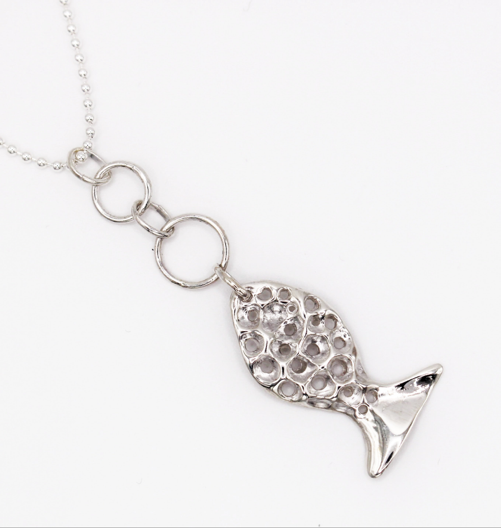 Sterling silver fish pendant, handcrafted using the lost wax casting technique. Unique Mediterranean-inspired jewelry, perfect for ocean lovers and sustainable fashion enthusiasts. Ethical and nature-inspired design, capturing the beauty of marine life in recycled silver