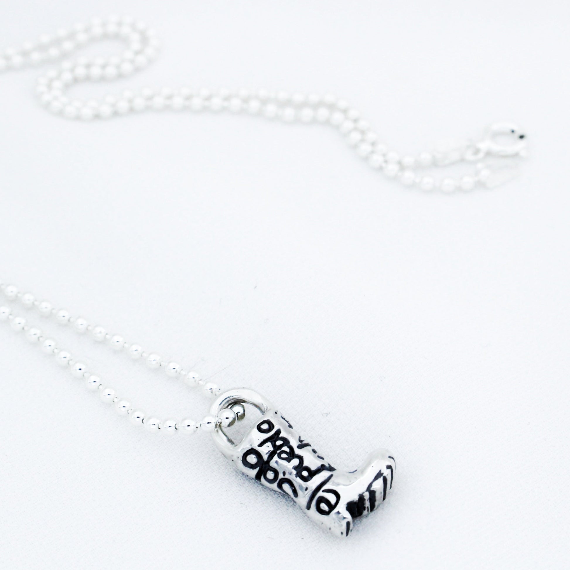 Sterling Silver 925 Beaded Chain Necklace with Solidarity Charm Silver 925 Rain Boot with engraved message Solo el Pueblo Salva al Pueblo