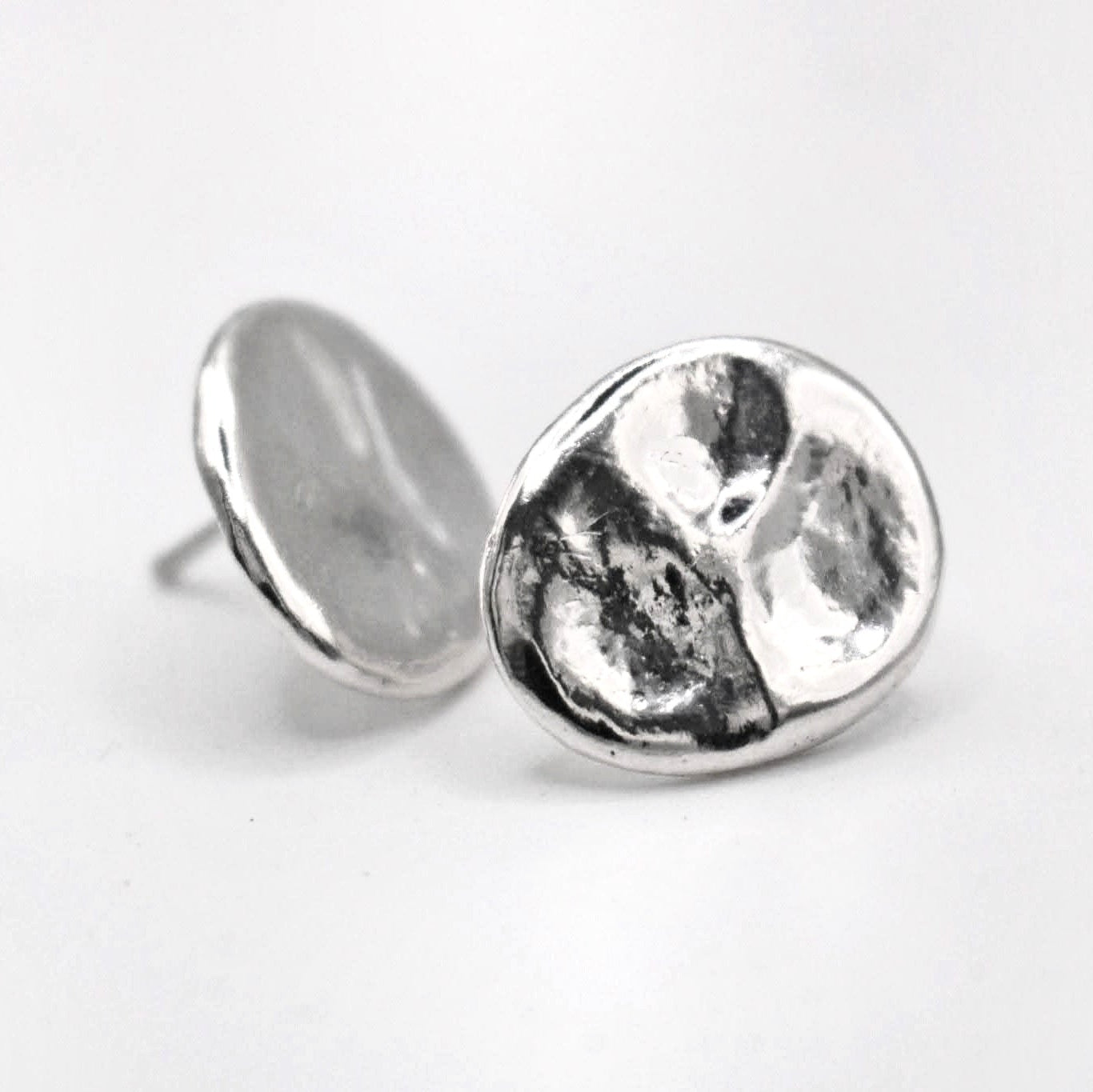 Contemporary oval sterling silver stud earrings with organic texture Mediterranean inspired jewelry