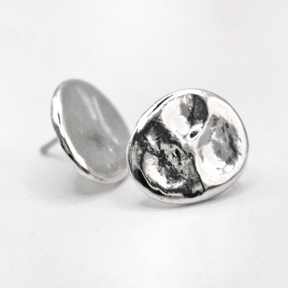 Contemporary oval sterling silver stud earrings with organic texture Mediterranean inspired jewelry