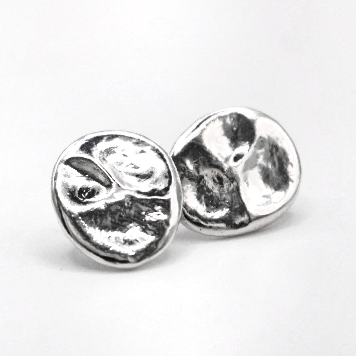 Handcrafted recycled 925 silver stud earrings abstract sculptural design close-up
