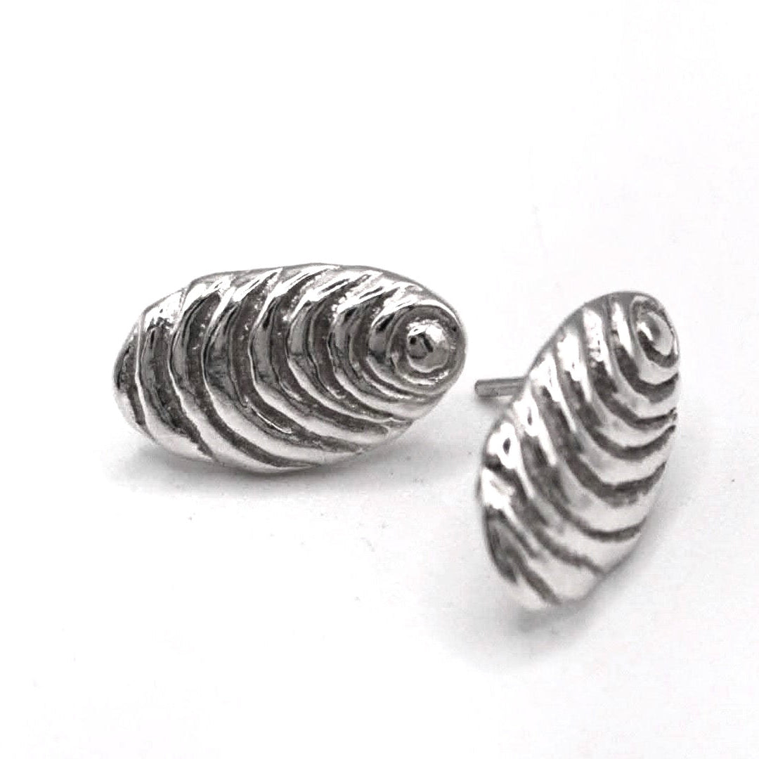 Organic sterling silver sun stud earrings textured oval handmade in Spain