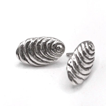 Organic sterling silver sun stud earrings textured oval handmade in Spain