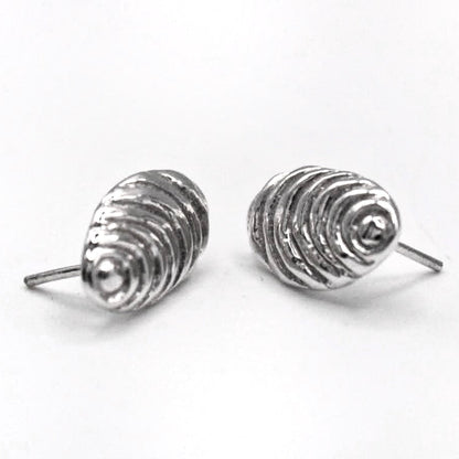 Organic sterling silver sun stud earrings textured oval handmade in Spain