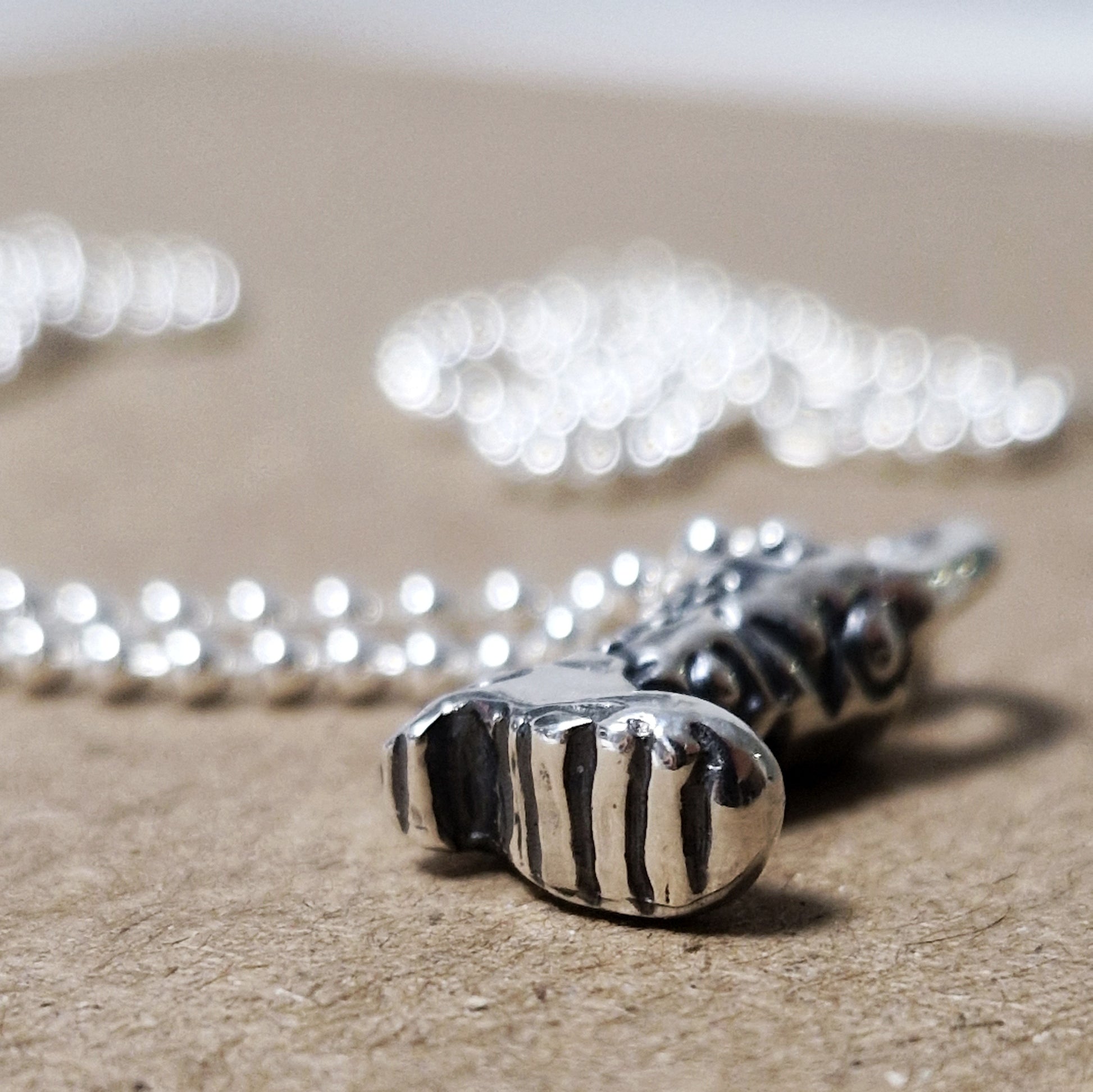 Sterling Silver 925 Beaded Chain Necklace with Solidarity Charm Silver 925 Rain Boot with engraved message Solo el Pueblo Salva al Pueblo