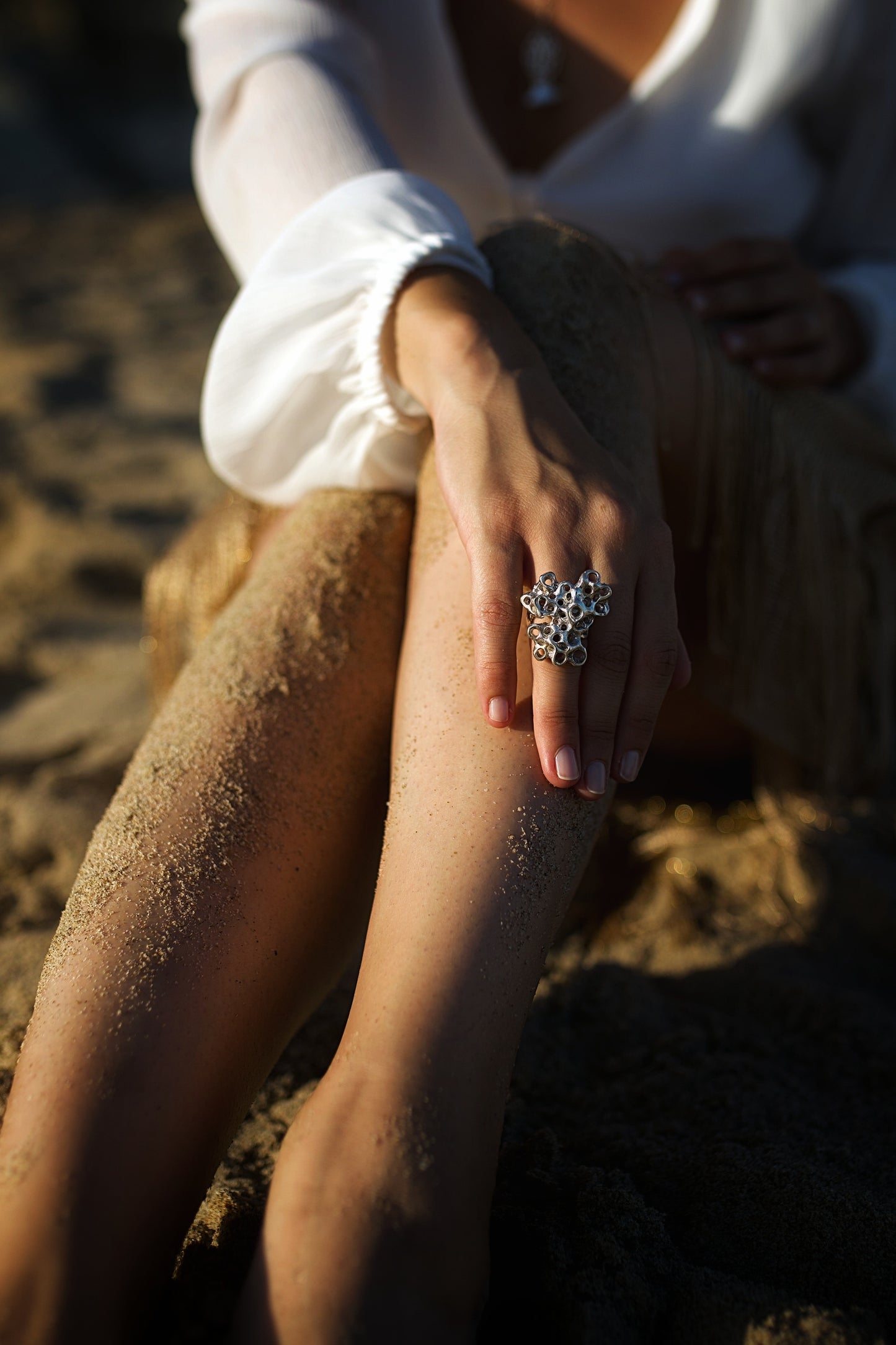 statement silver contemporary ring on hand designer ring ocean inspired design